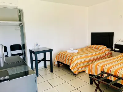 Hotel Cascada Hotels near Price Shoes
